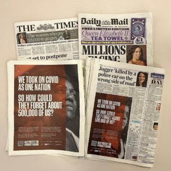 Newspapers showing adverts for the Forgotten 500K campaign